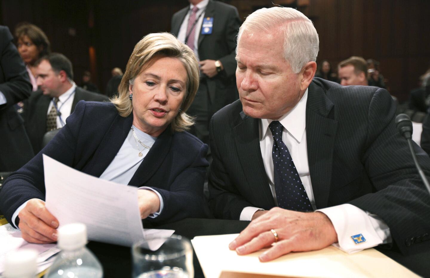 Hillary Rodham Clinton and Robert Gates