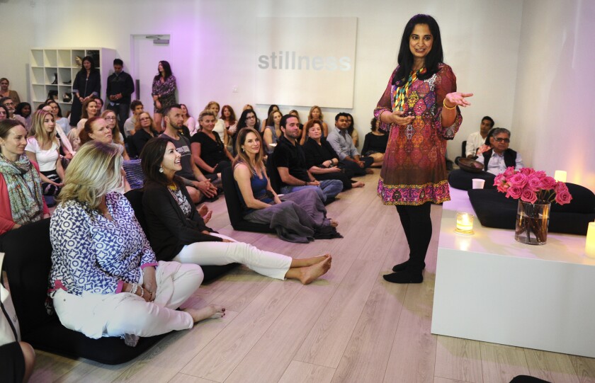 Malika Deepak speaks during a meditation session at Unplug Studio in Los Angeles.