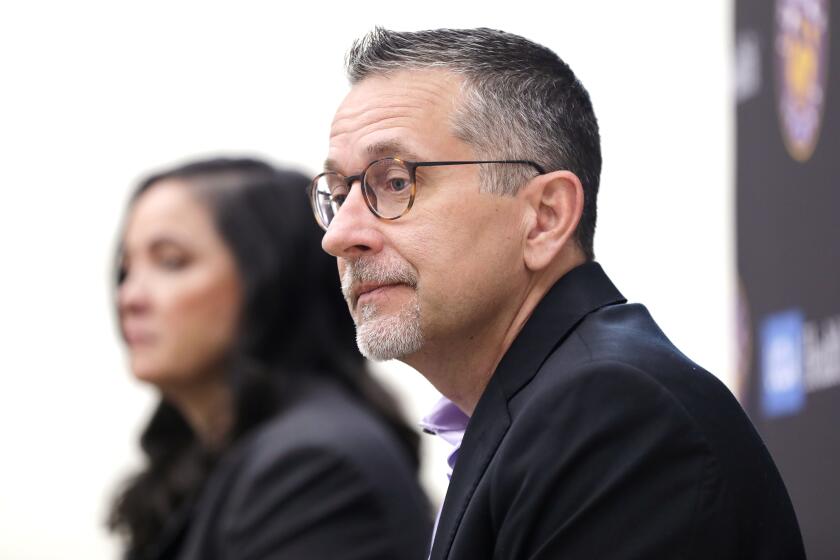 TORRANCE-CA-MAY 4, 2023: L.A. Sparks head coach Curt Miller, right, and general manager Karen Bryant.