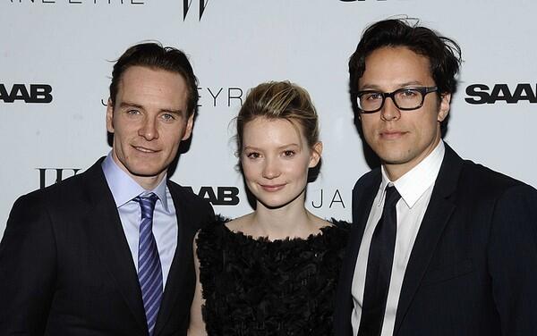 The latest retelling of Charlotte Bronte's classic story of a young girl with a difficult past and an employer with a secret stars Mia Wasikowska, center, as the title character and Michael Fassbender, left, as Rochester. Cary Fukunaga directed the film. The three gather for the premiere of the film at New York's Tribeca Grand Hotel.