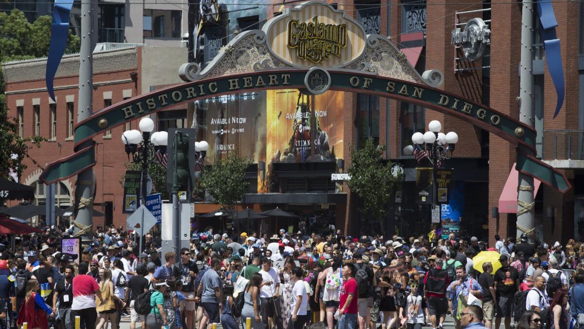 Large crowds cross the street from the San Diego Gaslamp Quarter to Comic-Con International 2017 at the San Diego Convention Center in San Diego, Calif., on July 22, 2017.