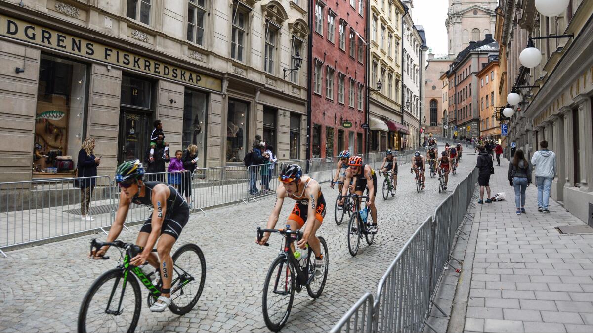 Jumpei Furuya of Japan leads the pack in the cycling discipline of the 2016ITU World Triathlon last month in Stockholm's Old City district. Scandinavian air is offering a $747 round-trip fare from LAX to Sweden's capital.