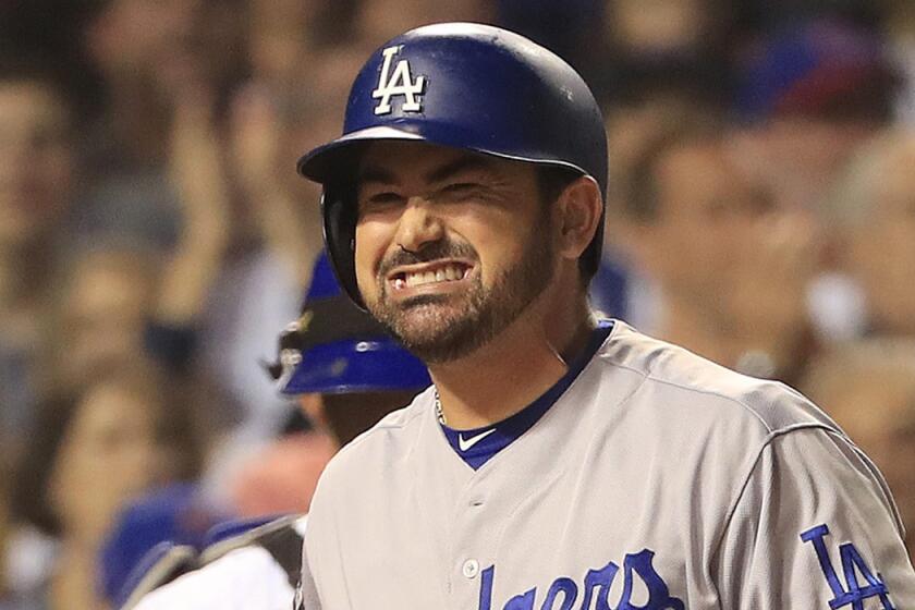 Dodgers' Adrian Gonzalez reacts after striking out against the Chicago Cubs on Sunday.