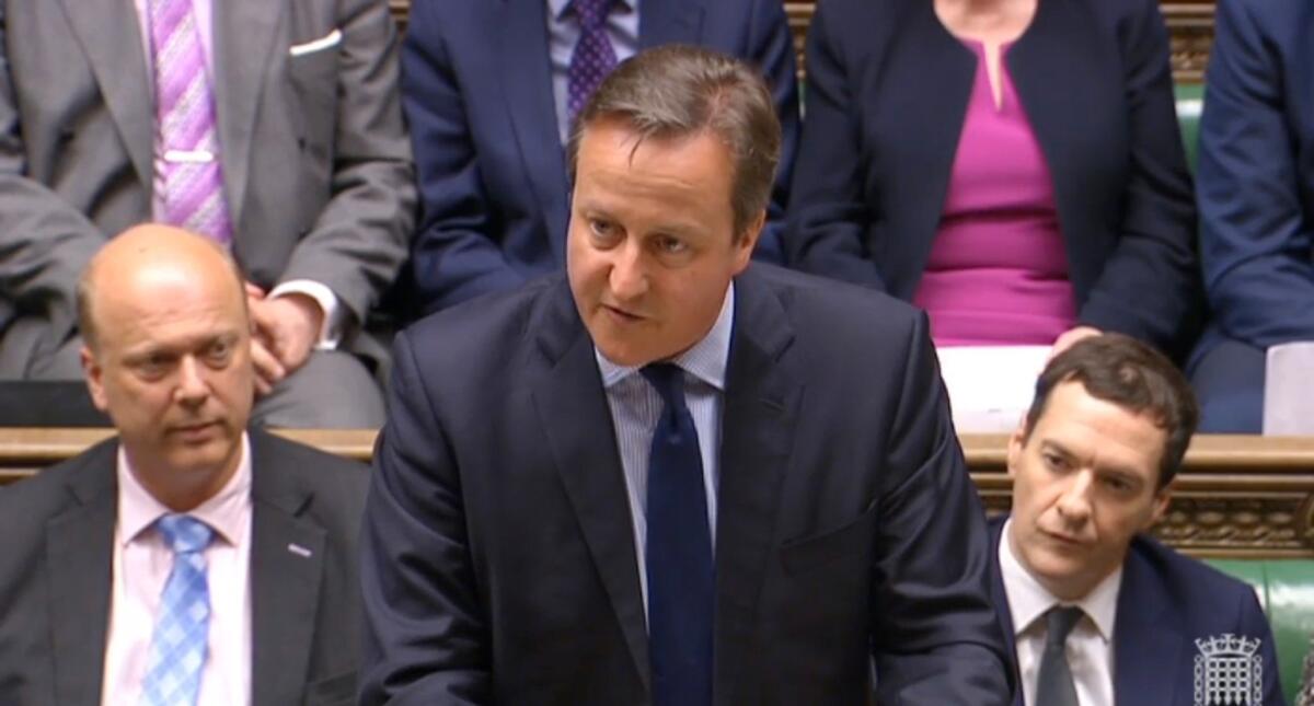 British Prime Minister David Cameron makes a statement to the House of Commons on April 11.