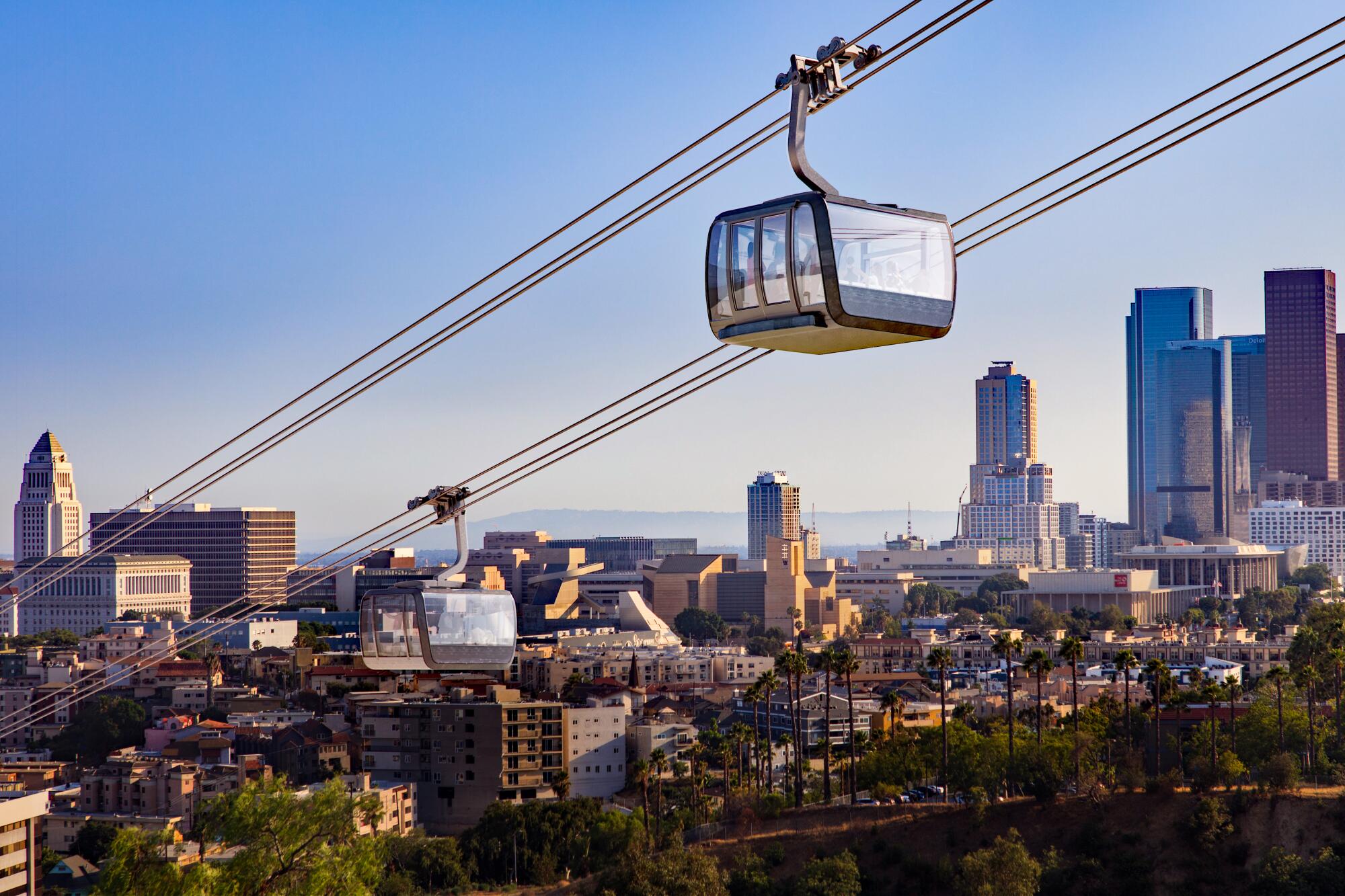 A rendering on a gondola cabin travelling on a cable with the skyline of downtown Los Angeles in the background.