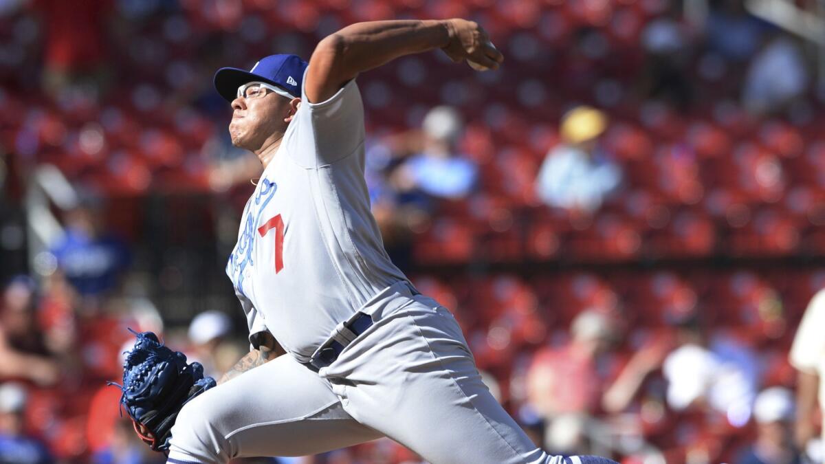 Julio Urias of the Dodgers throws against the St. Louis Cardinals on Saturday, his first appearance in the majors since May 2017.