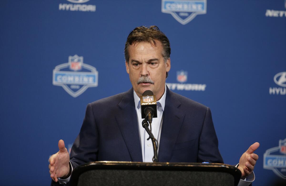 Rams Coach Jeff Fisher speaks at the NFL scouting combine Wednesday in Indianapolis.