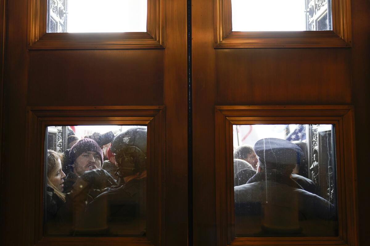 Rioters outside doors of U.S. Capitol on Jan. 6