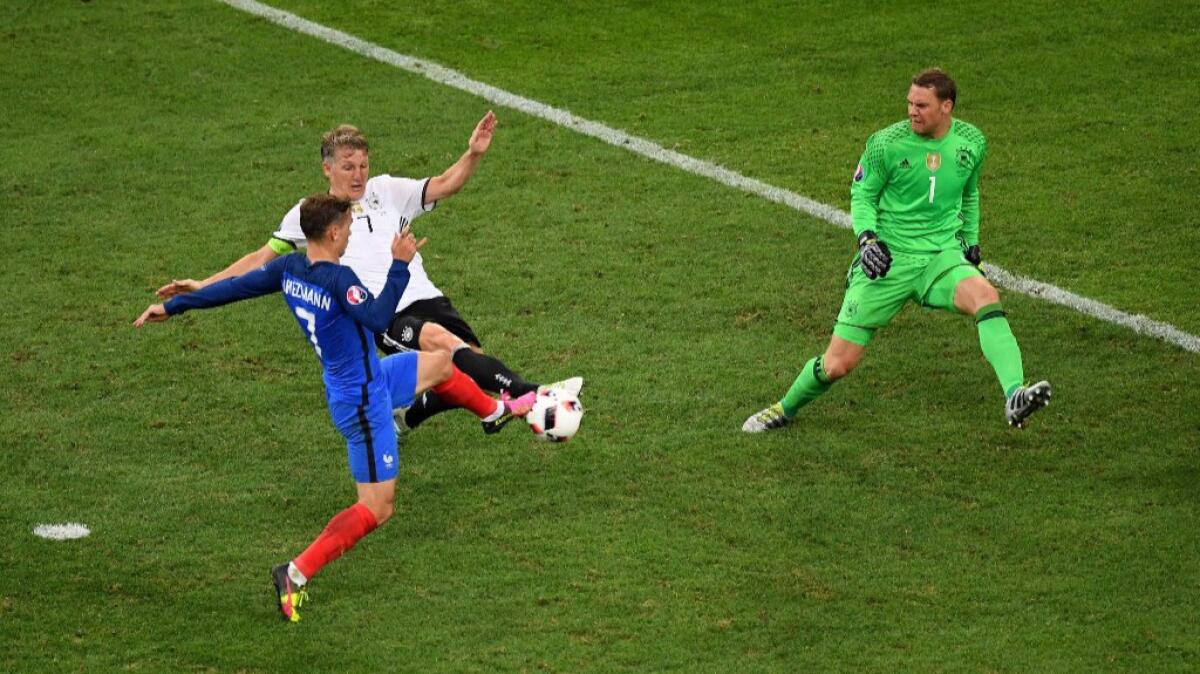 France's Antoine Griezmann scores a second goal against Germany during a European Championship semifinal match on July 7.