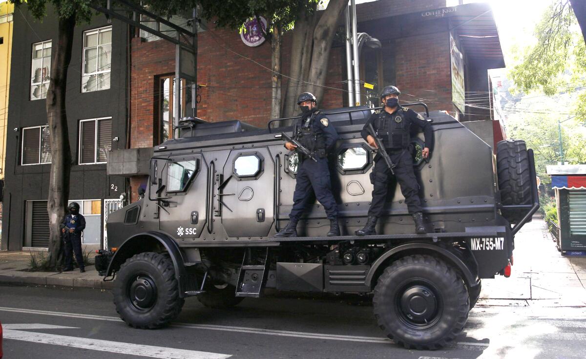 A police vehicle at the site of an attack against the Mexico City police chief  June 26. 
