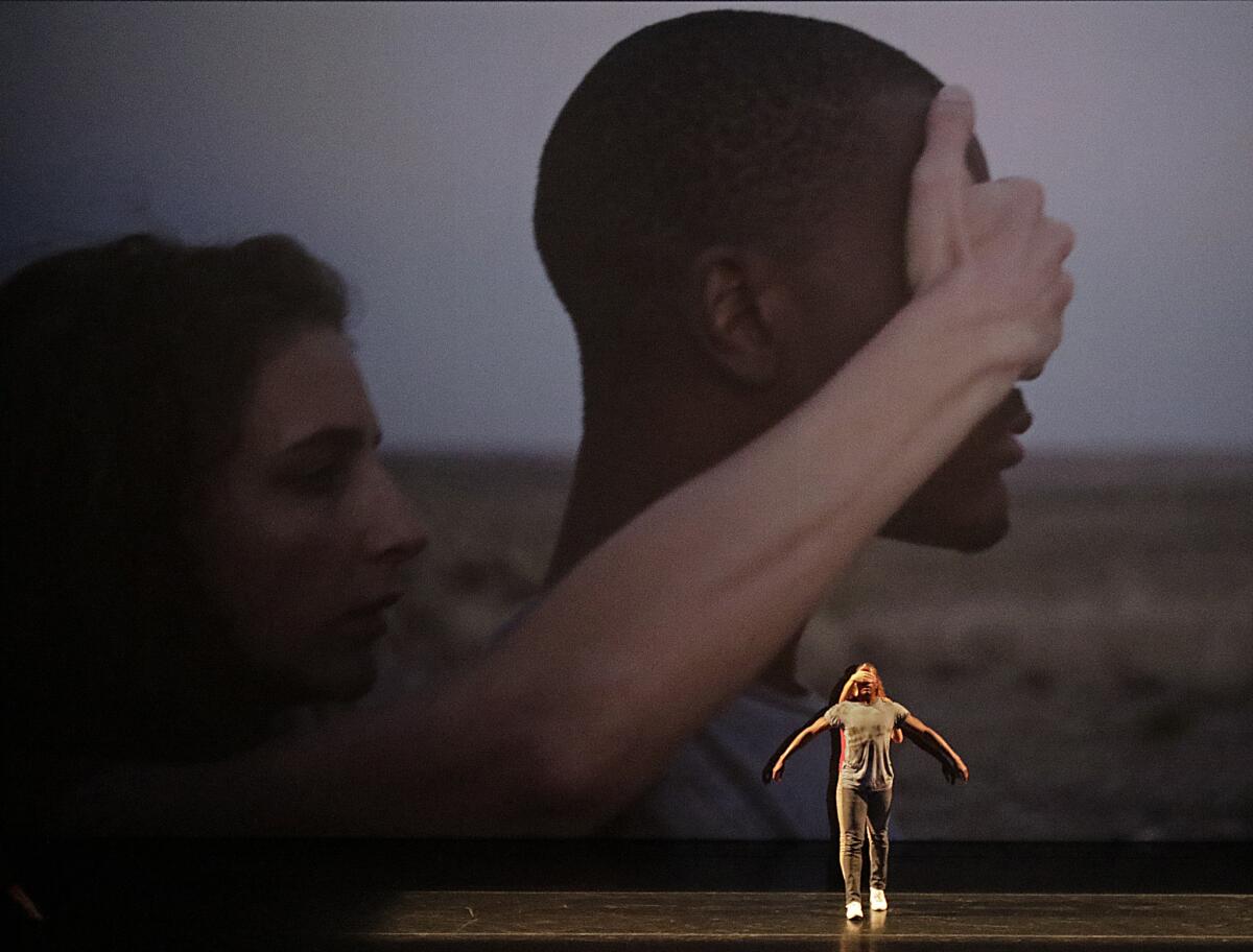 David Adrian Freeland Jr. and Rachelle Rafailedes dance with a video directed by Benjamin Millepied in "Orpheus Highway."