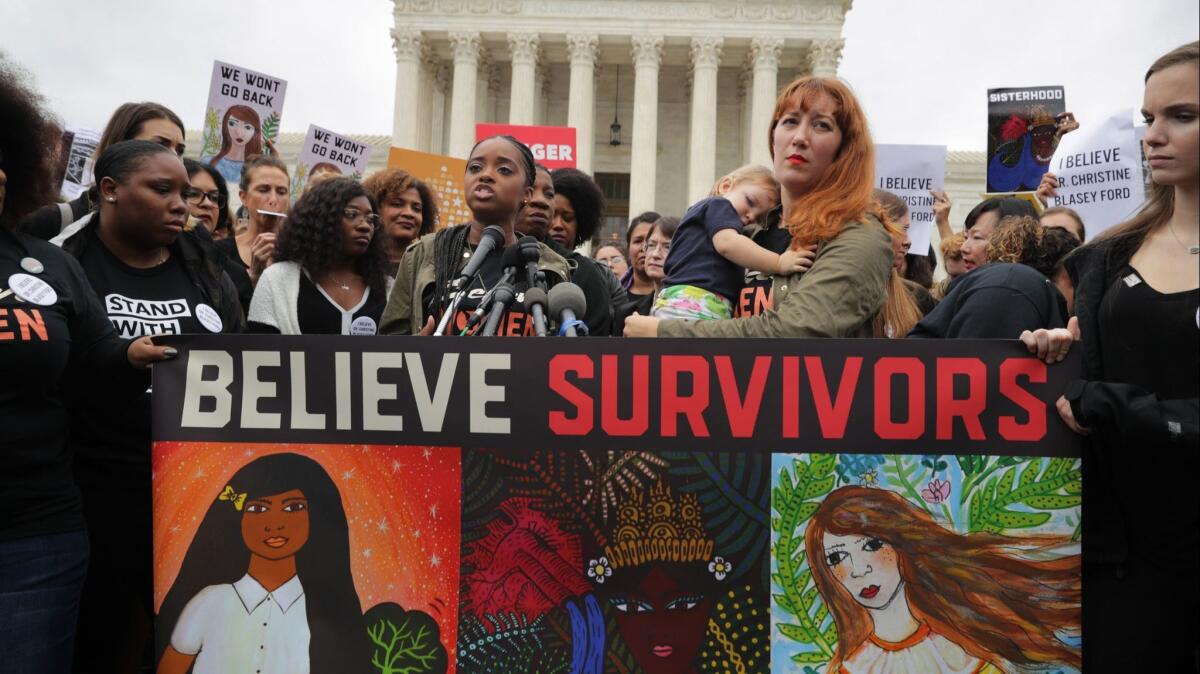 Activists march from the Senate to the Supreme Court in support of Christine Blasey Ford on September 24.