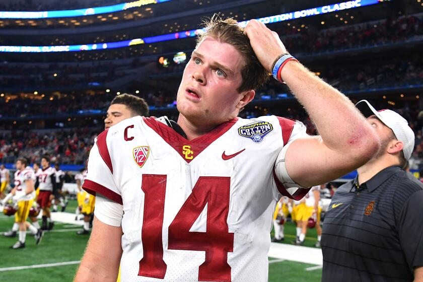 ARLINGTON, TEXAS DECEMBER 29, 2017-USC quarteraback Sam Darnold walks off the field.