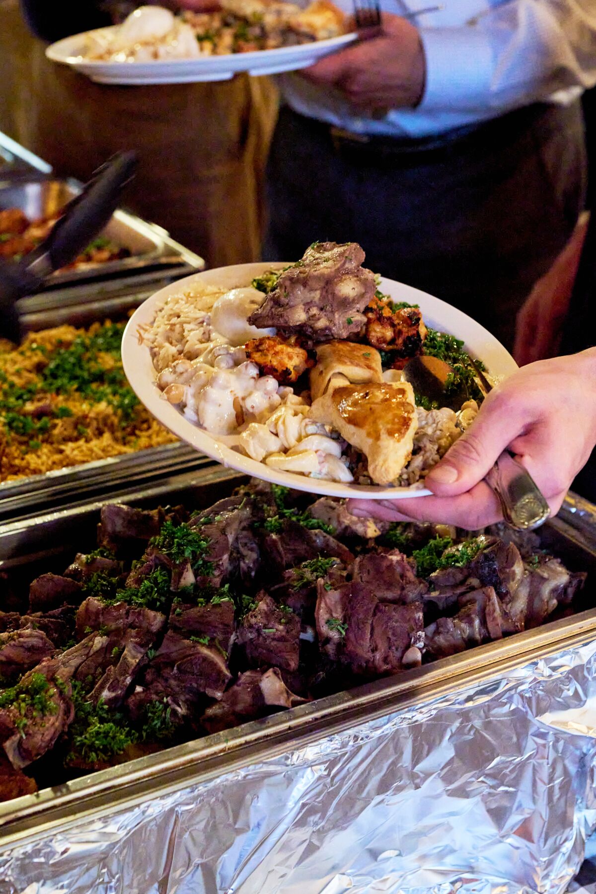 Diners break fast with an iftar buffet at Aleppo's Kitchen.
