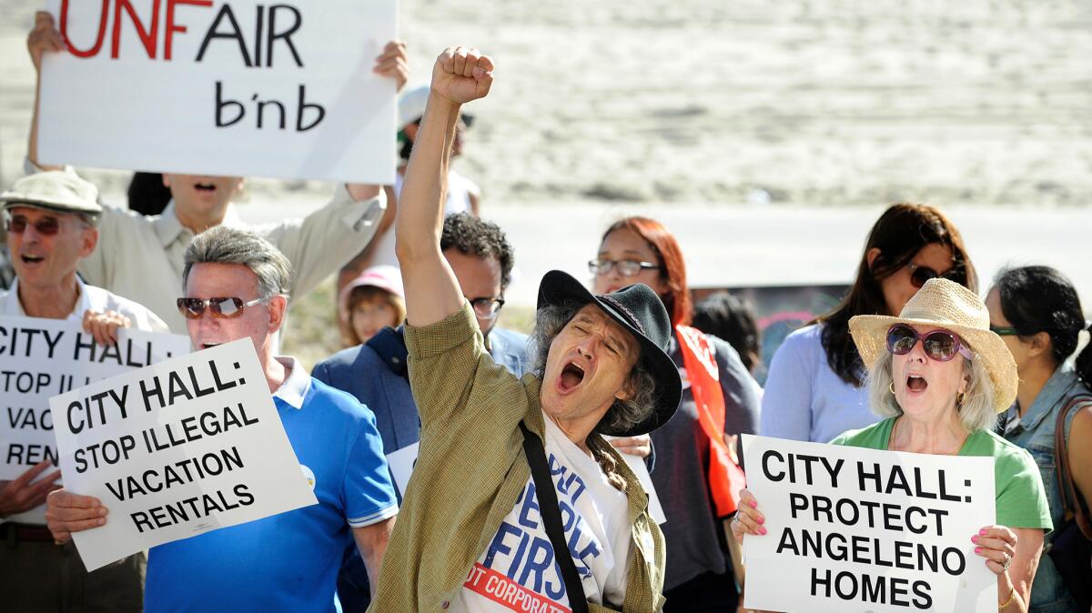Dozens of Venice residents, advocates and affordable housing supporters rallied on the Venice Boardwalk on Aug. 3, 2015 to call on Los Angeles City Council to regulate short-term rentals, end defacto hotels and protect affordable housing in Venice.