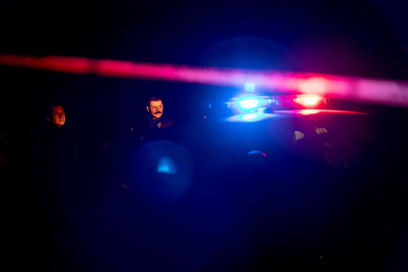Los Angeles, CA - December 14: Law enforcement near the home of Rob Reiner in Brentwood on Sunday, Dec. 14, 2025 in Los Angeles, CA. (Eric Thayer / Los Angeles Times)