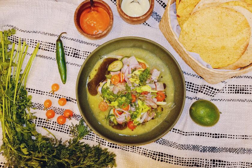 Jesus "Chuy" Cervantes, the chef de cuisine of Damian and Ditroit Taqueria, prepares ceviche in the Los Angeles Times Test Kitchen on July 24, 2024.