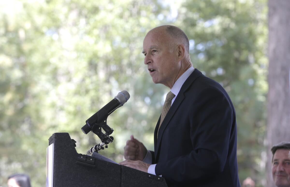 Gov. Jerry Brown, pictured here at a Lake Tahoe conference on Tuesday, opposes a decision by pension officials that could boost retirement benefits for some public employees.