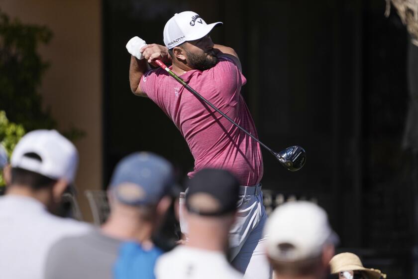 Jon Rahm hits from the fifth tee during the final round of the American Express golf tournament on the Pete Dye Stadium Course at PGA West Sunday, Jan. 22, 2023, in La Quinta, Calif. (AP Photo/Mark J. Terrill)