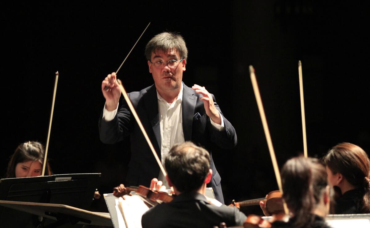 New York Philharmonic music director Alan Gilbert conducting the Academy Festival Orchestra in Santa Barbara in July.