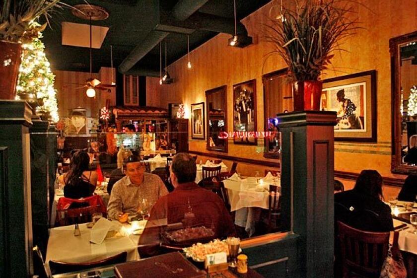 On weekend nights there's live tango music at family-run Argentine restaurant Carlitos Gardel.