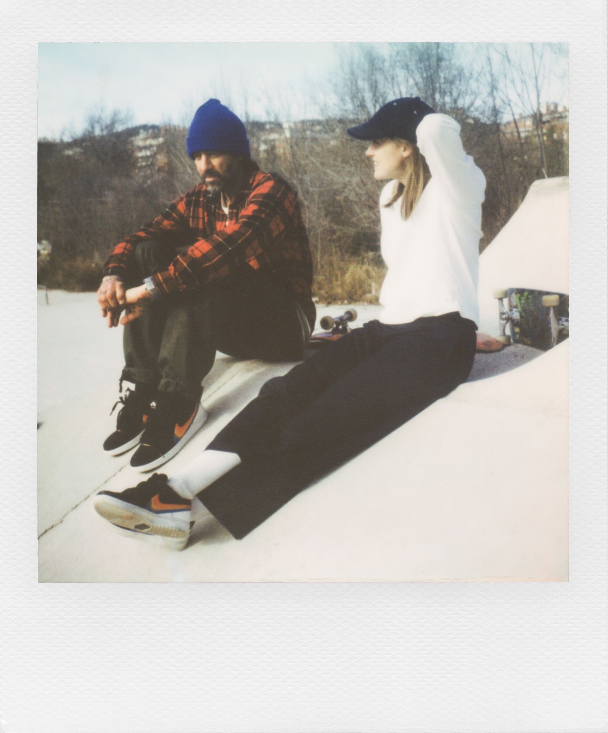Polaroid photo of Nike SB skateboarders Sarah Muerle and Brian Anderson.