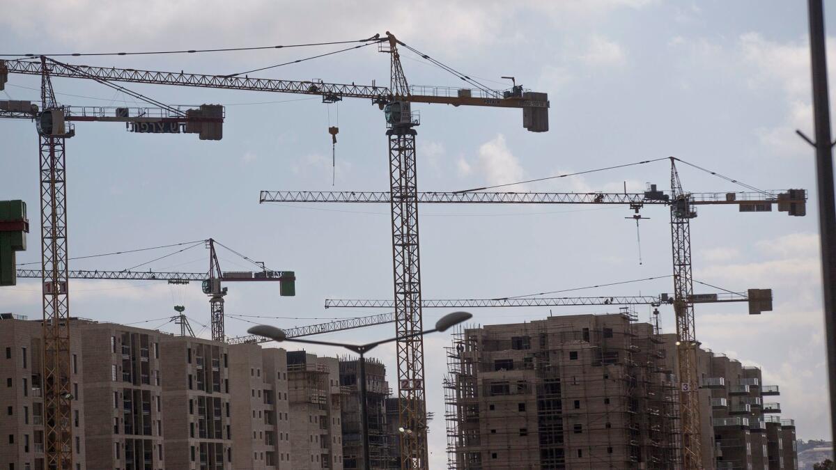 Construction is underway in the Har Homa settlement near the Palestinian neighborhood of Sur Baher. A city planning committee is expected to approve the building of 618 new houses in East Jerusalem.