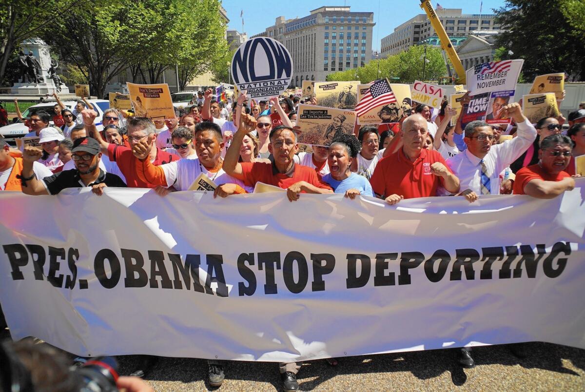 Immigrant rights activists march in Washington last August. The Obama administration has received criticism for the lack of progress on immigration reform.