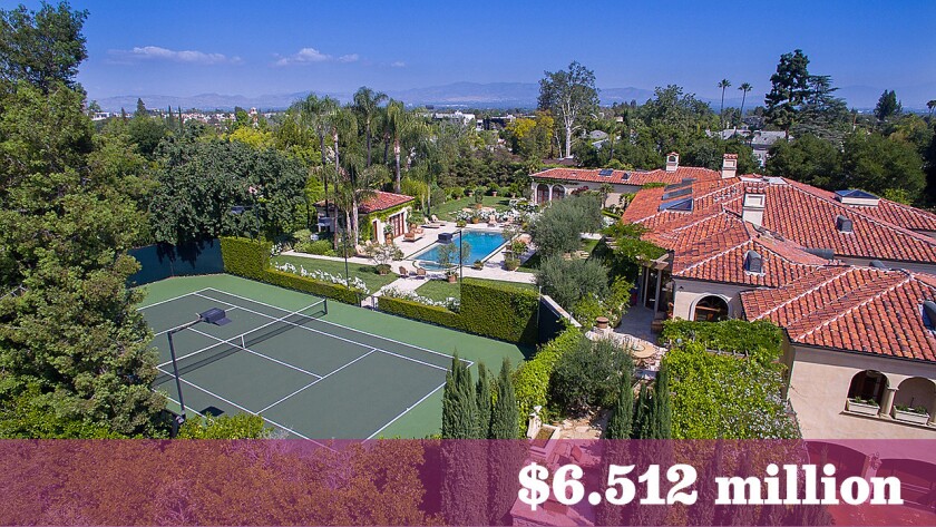 An Encino home once owned by Dick Van Dyke, and featuring carpentry by actor Harrison Ford, has sold for $6.512 million.