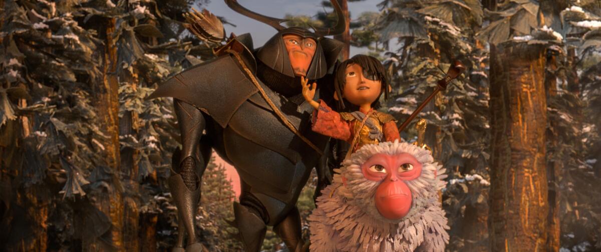 Beetle, voiced by Matthew McConnaghey, Kubo, voiced by Art Parkinson, and Monkey, voiced by Charlize Theron, in "Kubo and the Two Strings."