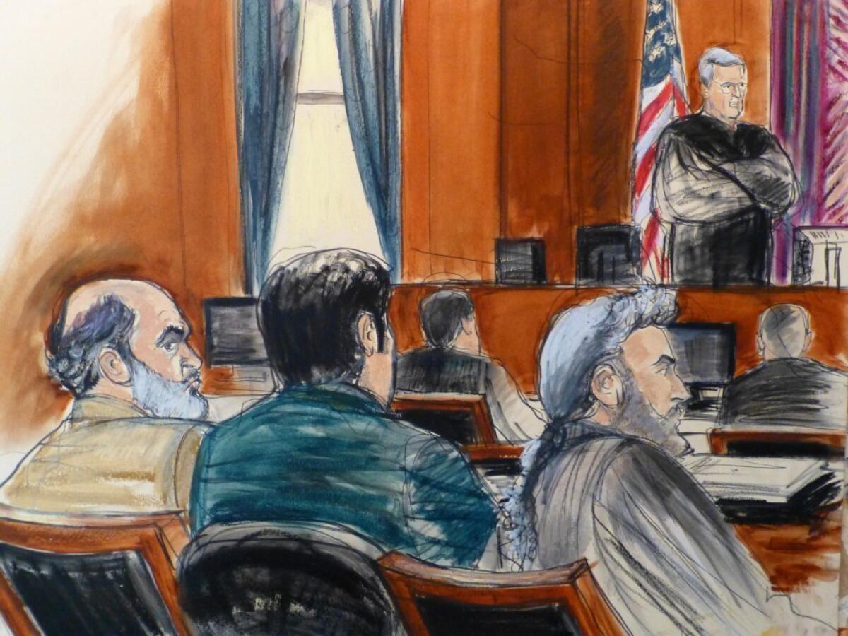 Sulaiman Abu Ghaith, left, in court in New York. Jury selection got underway in his terrorism trial.