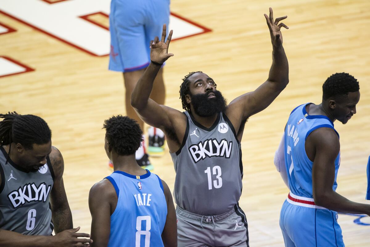 Brooklyn Nets guard James Harden (13) prepares to start prior to the first half of an NBA basketball game against the Houston Rockets Wednesday, March 3, 2021, in Houston. (Mark Mulligan/Houston Chronicle via AP)