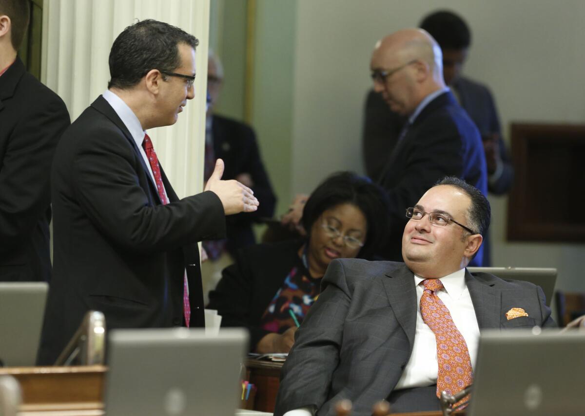 Assemblyman Bob Blumenfield (D-Woodland Hills), left, speaks with Assembly Speaker John A. Perez (D-Los Angeles) at the Capitol in May. Blumenfield is proposing a constitutional amendment that would make it easier for cities and counties to raise property taxes or issue bonds.