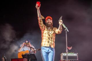 Indio, CA - April 27: Post Malone performs on the Mane Stage on the second day of Stagecoach Country Music Festival at the Empire Polo Club in Indio Saturday, April 27, 2024. (Allen J. Schaben / Los Angeles Times)