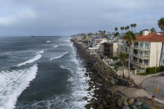 Oceanside, CA - October 14: The homes on the 1000 block of South Pacific Street in Oceanside, where property owners want to rebuild the rock seawall between 913 and 1027 South Pacific Street. Several of the homes have illegally placed stairs on the rocks for access. (Nelvin C. Cepeda / The San Diego Union-Tribune)