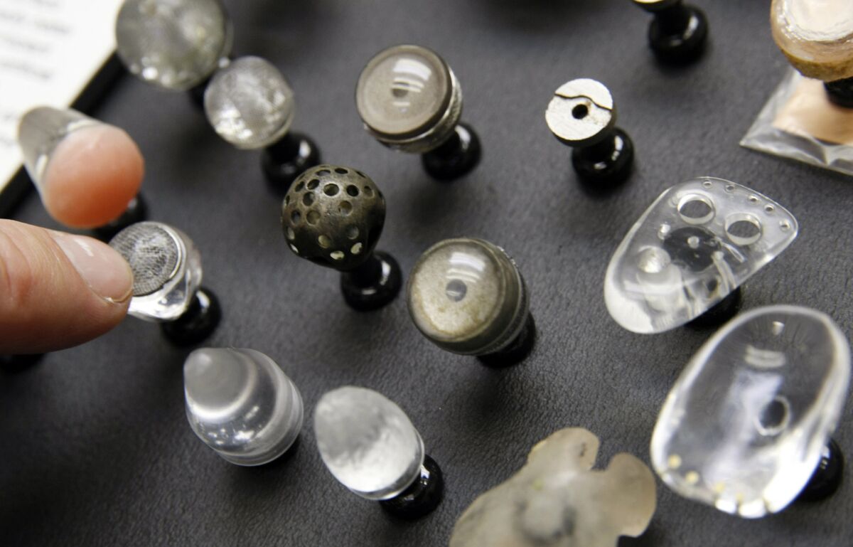 A collection of orbital eye implants used from the early 1940s to the 1990s.
