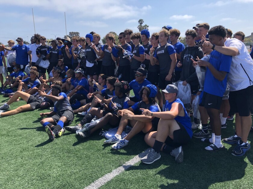 Santa Margarita players celebrate their championship at the Edison seven-on-seven passing tournament.
