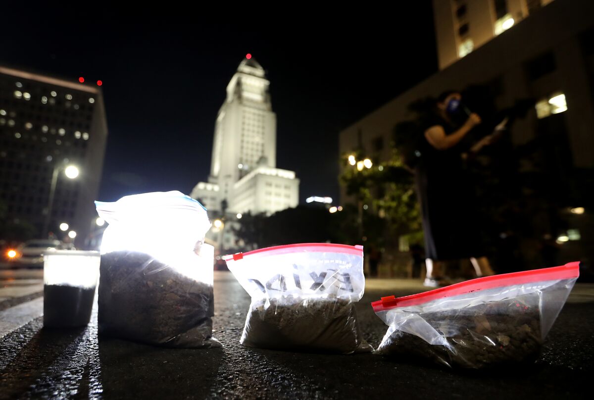 Exide protesters leave bags of lead-contaminated dirt in downtown L.A.