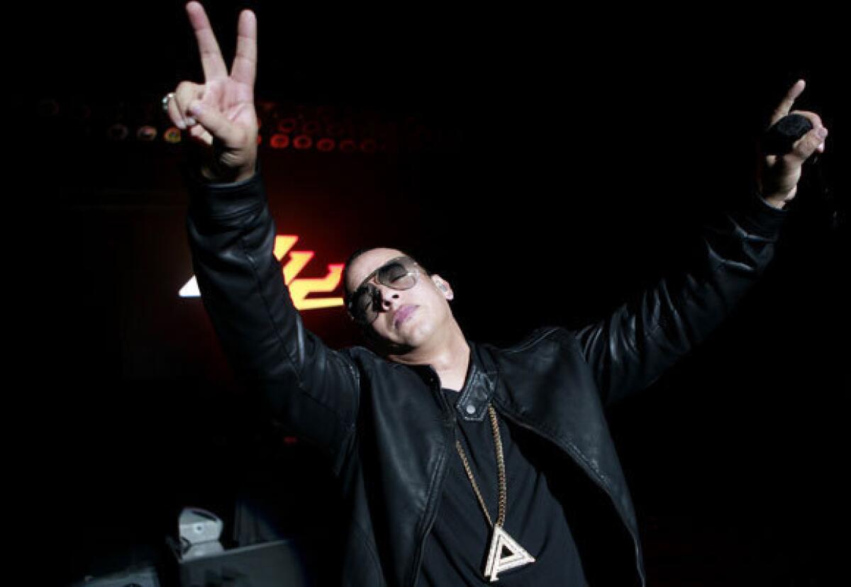 Latin Grammy Award-winning recording artist Daddy Yankee performs at the Greek Theatre in Los Angeles on Sunday.