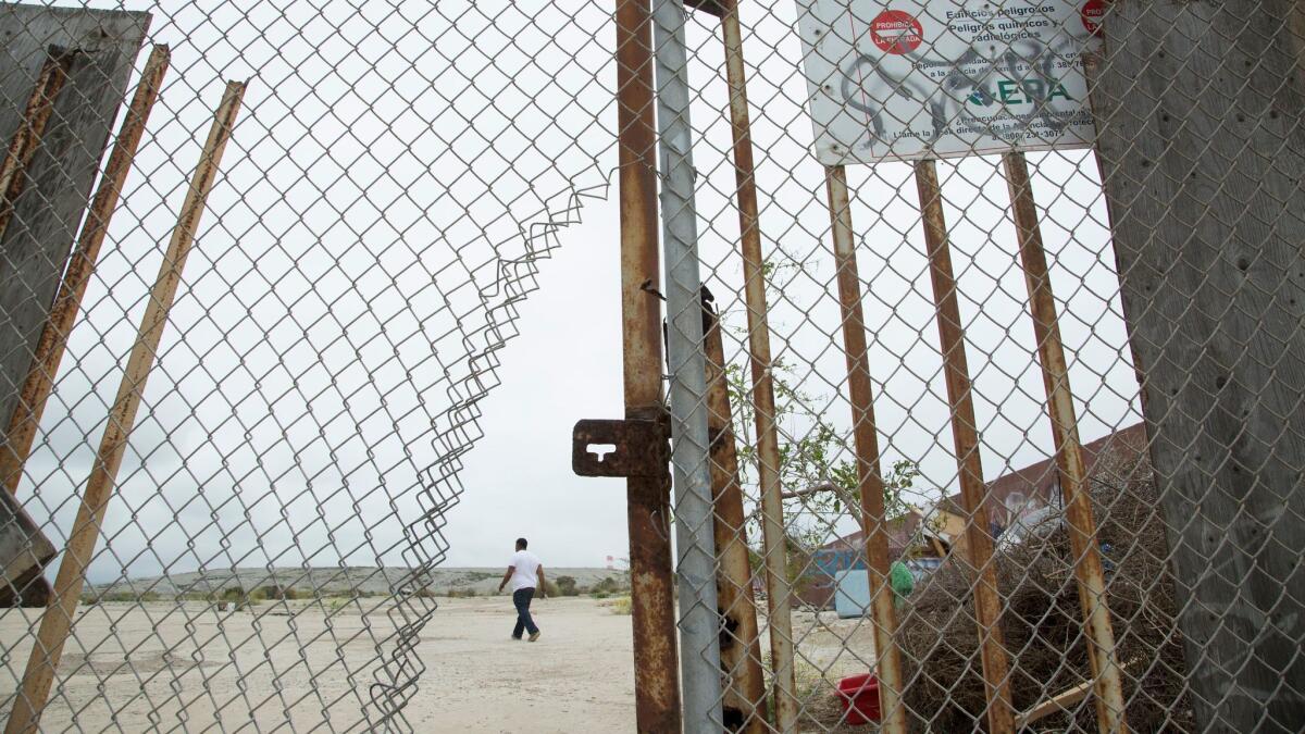 A homeless encampment has taken over the former Halaco Engineering Co. property, now a Superfund site in Oxnard.