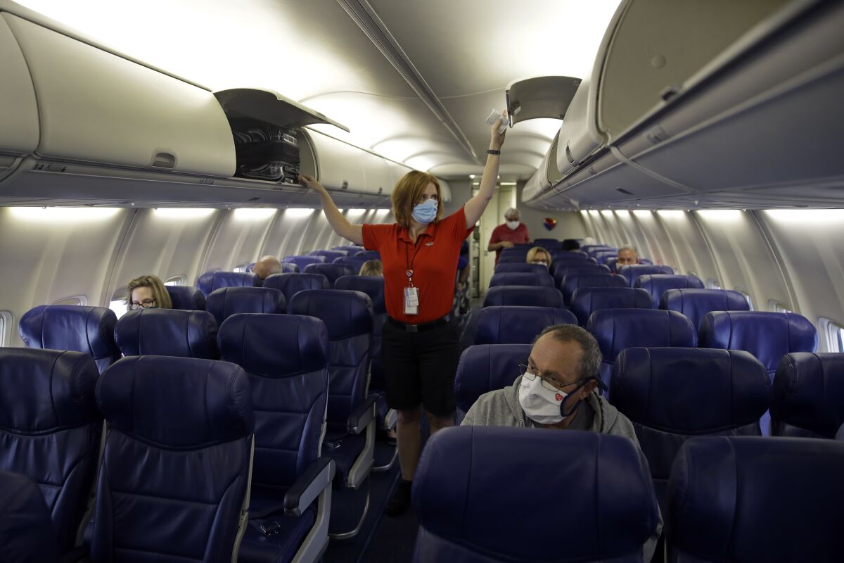 In this May 24, 2020 file photo, a Southwest Airlines flight  