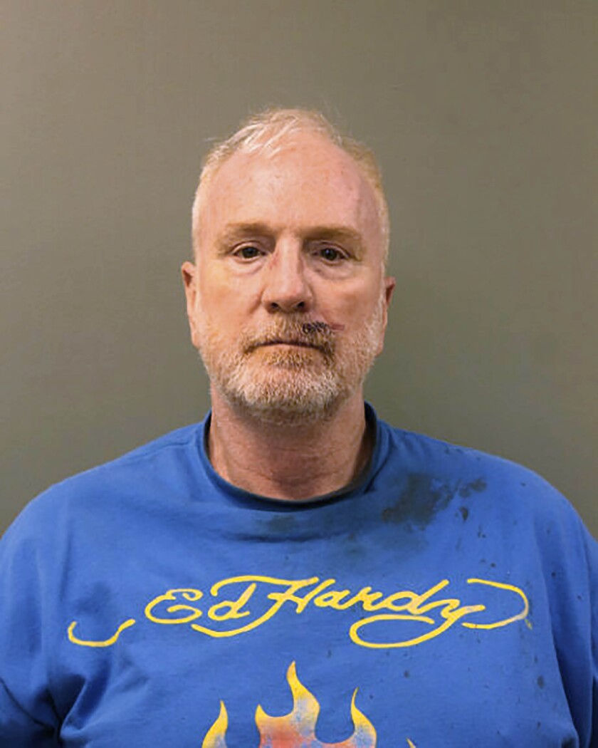 This photo provided by the Chicago Police Department shows Timothy Nielsen, charged Monday, May 3, 2021 with four counts of attempted murder and ordered held without bond by Cook County Circuit Judge John Fitzgerald Lyke. Prosecutors say 10 people were celebrating a birthday Sunday when the Nielsen drove up to the group and complained about the behavior of the group’s dogs. After members of the group asked him to leave, he drove onto the median. (Chicago Police Department via AP)