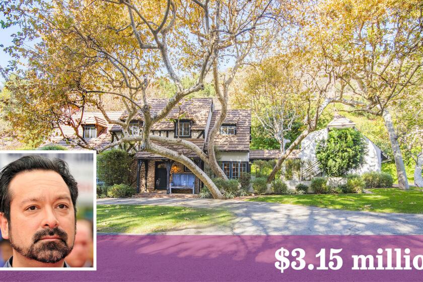 The Brittany Tudor-inspired home in the Mandeville Canyon area was designed by architect Gerard R. Coldcord.