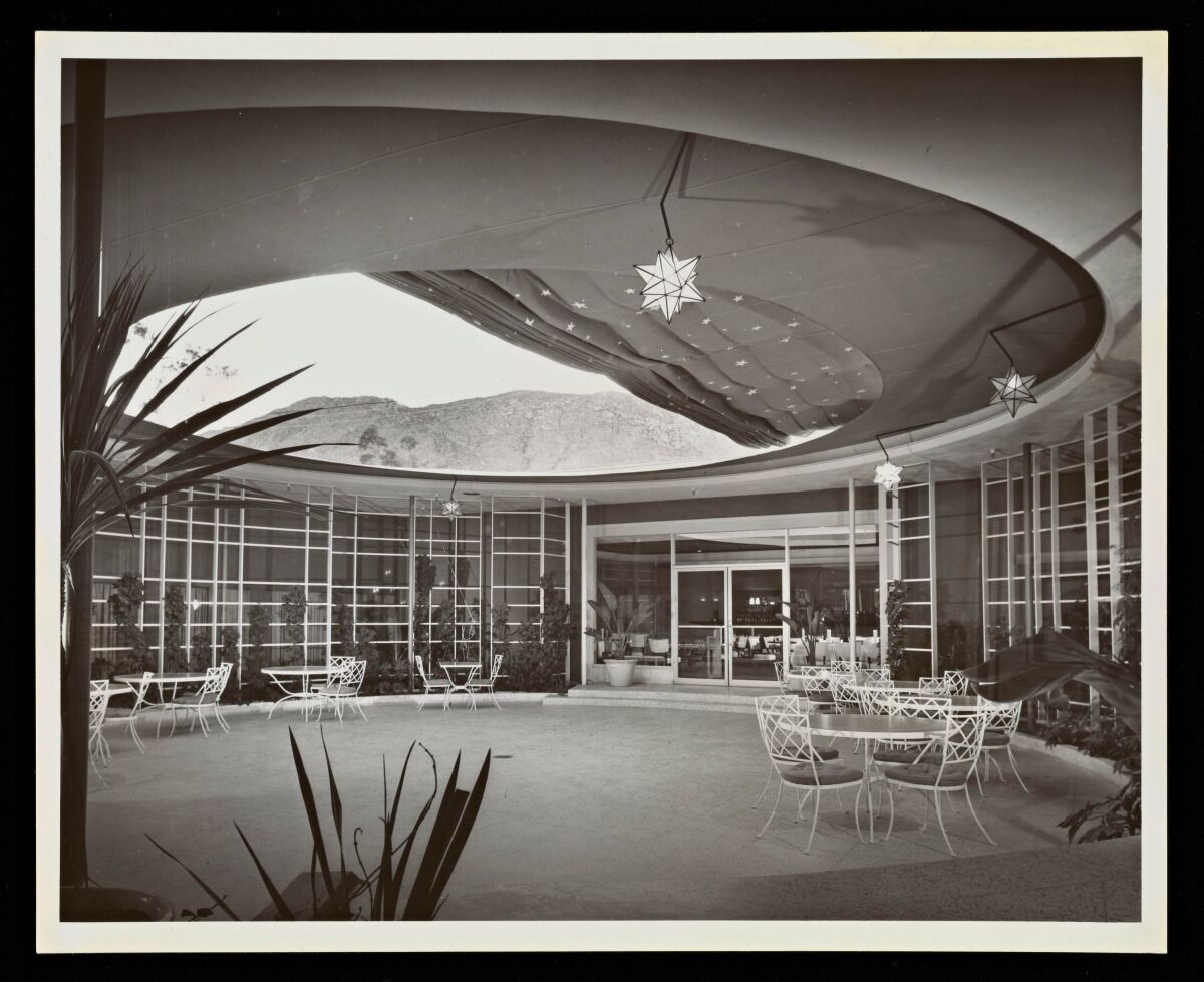 A black and white image of the circular open-air patio at the El Mirador Hotel in Palm Springs.