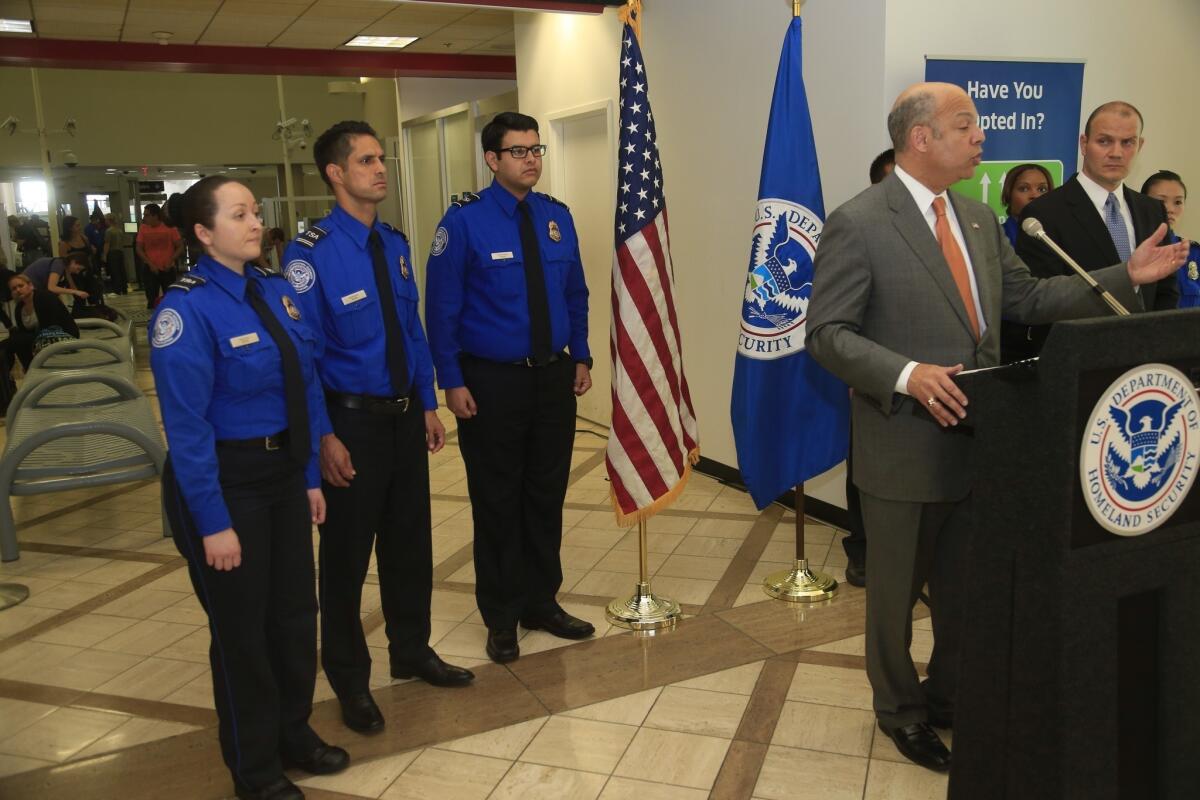 Secretary of Homeland Security Jeh Johnson tours Los Angeles International Airport, where he honored fallen TSA officer Gerardo I. Hernandez, who was killed in a shooting last year in Terminal 3.