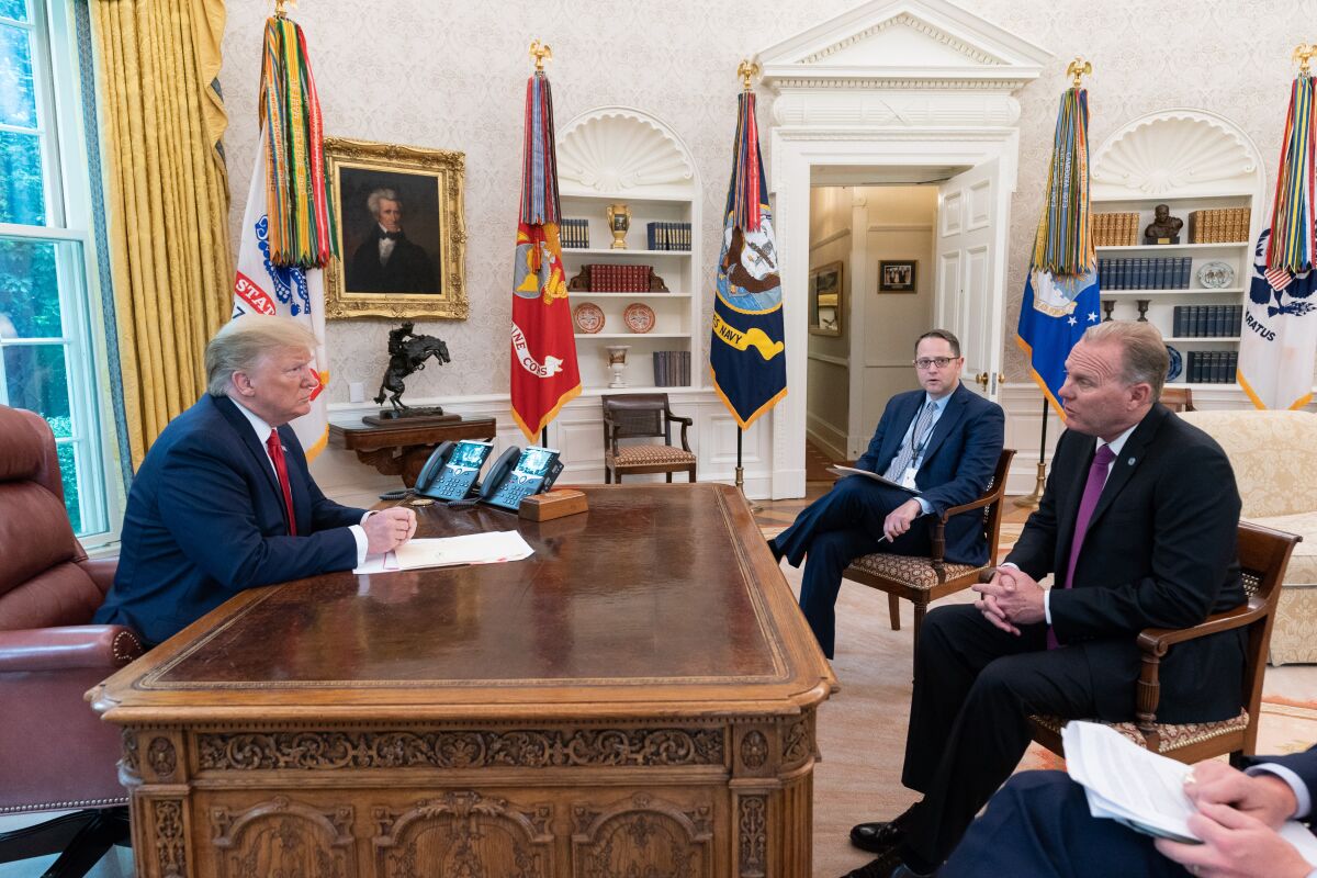 Then-San Diego Mayor Kevin Faulconer meets with President Donald Trump.