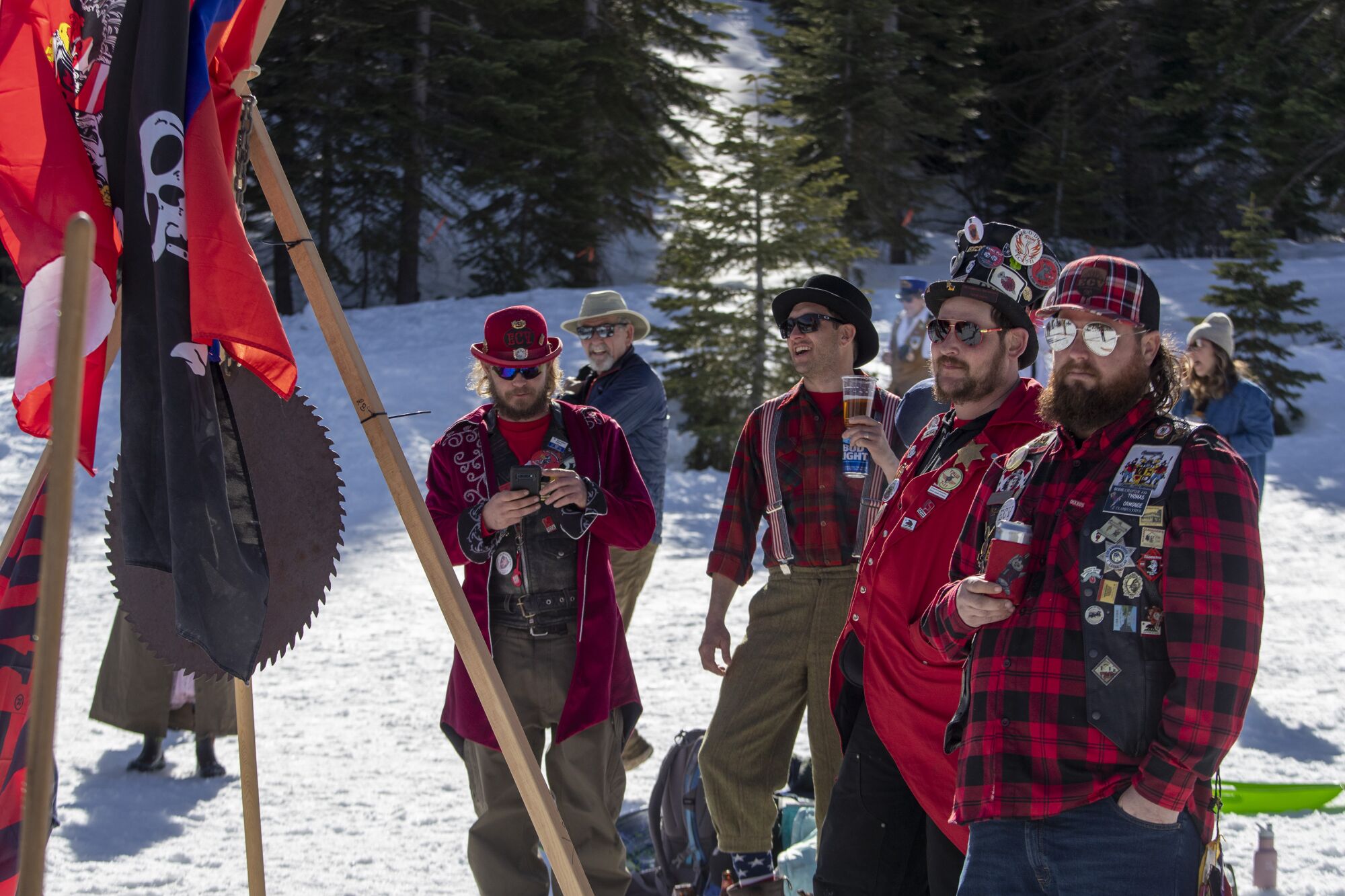 Members of a historical society watch racers compete