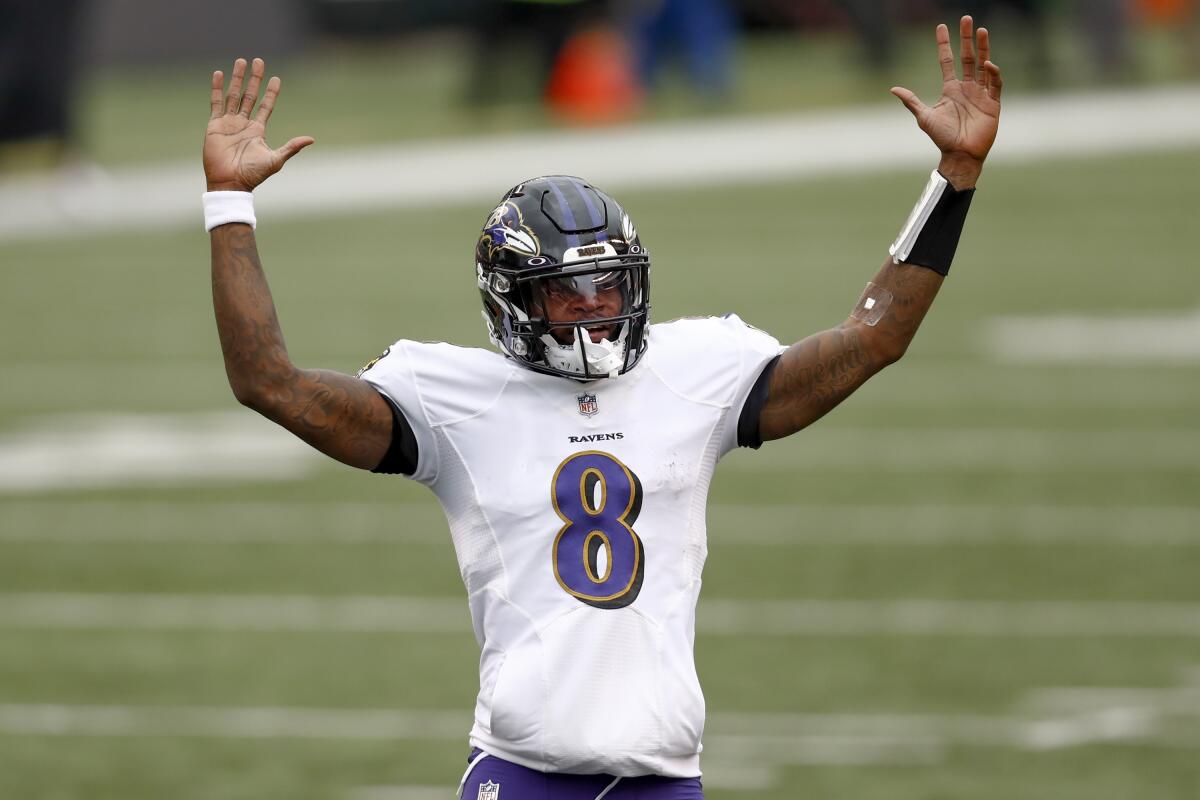 Baltimore Ravens quarterback Lamar Jackson celebrates after a touchdown against the Cincinnati Bengals on Sunday.