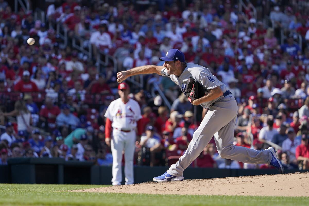 Dodgers pitcher Max Scherzer throws during the fourth inning against the St. Louis Cardinals Monday.