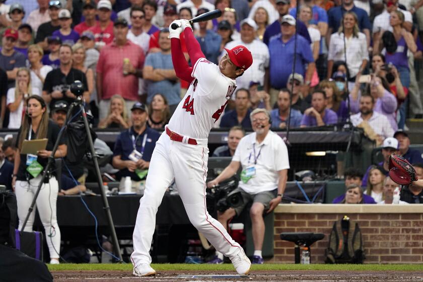 American League's Shohei Ohtani, of the Los Angeles Angeles, hits during the first round of the MLB All Star baseball Home Run Derby, Monday, July 12, 2021, in Denver. (AP Photo/Gabriel Christus)